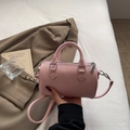 Sac Boston rose grainé avec poignées arrondies et bandoulière amovible - Rose Sans Pendentif