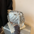 Chic silver quilted leather handbag with metal chain and adjustable strap - Silver