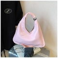 Pink minimalist handbag with a unique curved shape and modern silver metal ball detail - Pink