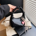 Glossy black hobo bag with pleated handle, heart pendant and stylish striped ribbon strap - With Pendant / Black