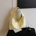 Minimalist cream yellow tote bag in glossy PU leather with wide shoulder strap - Yellow