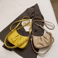 Minimalist pleated crescent shoulder bags in bright yellow and beige with woven handles - Khaki