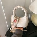 Chic beige crescent handbag with pleated cloud handle and colorful fringe charms - With Pendant / White