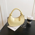 Pale yellow crescent moon shoulder bag with knotted handle and silver chain strap - Yellow
