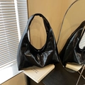 Minimalist black glossy leather hobo shoulder bag with large capacity and smooth finish - Black