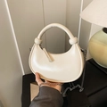 Creamy white semi-circle hobo bag with knotted handle and silver chain strap - White