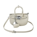 Creamy white lychee grain leather mini handbag with heart pendant and silver clasp - Off White