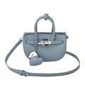 Light blue pebbled leather mini handbag with silver twist lock and heart pendant charm - Blue