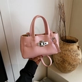 Pink lychee grain leather handbag with silver lock and detachable shoulder strap - Pink