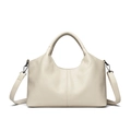 Elegant off-white sheepskin bucket bag with fine stitching and silver hardware detail - Off White