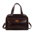 Vintage dark brown leather handbag with gold oval twist lock and adjustable shoulder strap - Brown
