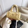 Light yellow cylindrical handbag with heart quilting and delicate bow detail - Yellow