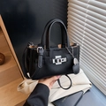 Classic black leather handbag with litchi texture and silver hardware with heart charm - Black