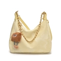 Cream vintage matte tote bag with gold chain strap and brown plush charm accessory - Yellow Large
