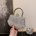 Borsa da sera argento con strass, manico tondo in metallo e chiusura elegante con perla - Argento
