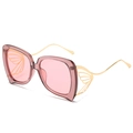 Lunettes de soleil papillon avec monture rose translucide et branches dorées - Monture Rose / Verres Roses
