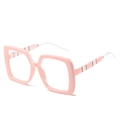 Lunettes de soleil carrées oversize roses avec branches rayées pour un style tendance - Monture Rose Verres Transparents
