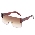 Modern rimless shield sunglasses with brown gradient lenses and translucent red temples - Tea Frame Gradient Tea Lens