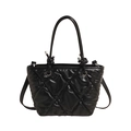 Modern black quilted tote bag with decorative knot handle and crossbody strap - Black