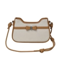 Retro cream canvas shoulder bag with brown leather trim and bow detail on white background - Off White