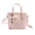 Sac à main rose en similicuir avec breloque nœud en perles et bandoulière amovible - Rose