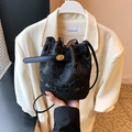 Mini black bucket bag with snakeskin texture and golden twist-lock buckle - Black