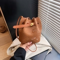 Brown snakeskin embossed mini bucket bag with gold twist lock and shoulder strap - Brown