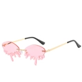 Schicke randlose Sonnenbrille in Tropfenform mit rosa Gläsern und goldenen Metallbügeln - Goldener Rahmen Rosa Gläser