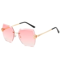 Lunettes de soleil géométriques sans monture avec verres dégradés roses et métal doré - Monture Dorée Double Rose