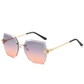 Lunettes sans monture géométriques avec verres dégradés violets et branches dorées - Monture Dorée Gris Orange