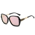 Classic oversized women sunglasses with black frames and pink mirrored lenses in 45-degree view - Black Frame Pink Lens