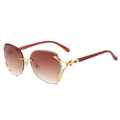 Randlose Sonnenbrille mit braunem Verlauf, goldenem Leopardenkopf und roten Bügelenden - Goldener Rahmen Verlaufs-Tee-Gläser