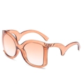 Oversized amber orange sunglasses with gradient lenses and wavy temple design - Tea Frame Double Tea