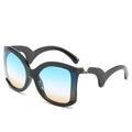 Fashionable black wave frame sunglasses with blue-orange gradient lenses and gold accents - Black Frame / Blue-Yellow Lens
