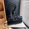 Sac à main noir minimaliste avec deux nœuds et longues anses pour porter à l'épaule - Noir