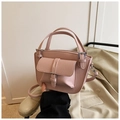 Pink lychee grain leather crossbody bag with front pocket and adjustable shoulder strap - Purple