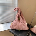 Pink woven knit shoulder bag with hollow texture and handmade 3D floral accents - Pink