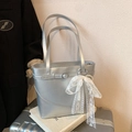 Silver metallic bucket tote bag featuring a white lace bow and elegant pearl charms - With Pendant / Silver