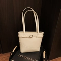 Minimalist white leather bucket bag with metal buckle and long handles for shoulder wear - No Pendant / White