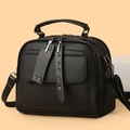 French style black saddle bag in lychee texture with silver hardware and top handle - Black