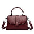 Trapezoidal burgundy soft faux leather handbag with crackle texture and top handle - Red