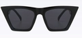 Fashionable black cat-eye sunglasses with wide geometric frames and dark grey lenses - Black Frame Grey Lens