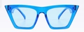Cat eye sunglasses with transparent blue frame and light blue lenses in a stylish flat lay - Blue Frame / Blue Lens
