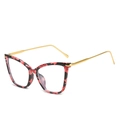 Stilvolle Cat-Eye-Brille mit rot marmoriertem Rahmen und goldene Metallbügel - Blumenmuster Rahmen