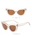 Cat eye sunglasses featuring champagne frames and brown lenses in front and side views - Champagne Frame Tea Lens