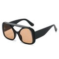Gafas de sol Y2K oversize con montura negra plana y lentes tintadas de color naranja - Régulier / Montura Negra Lentes Champaña