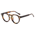 Retro round tortoiseshell sunglasses with silver rivet accents and polished finish - Regular / Standard Tortoiseshell Frame with Clear Lenses