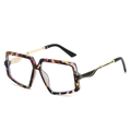 Lunettes hexagonales oversize avec monture léopard colorée et branches en métal doré - Monture Fleurie Violette Verres Blancs