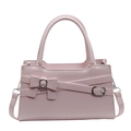 Borsa a mano rosa chiaro in ecopelle con fiocco decorativo e tracolla regolabile - Rosa