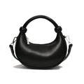 Classic black crescent handbag in faux leather with a minimalist knot handle detail - Black